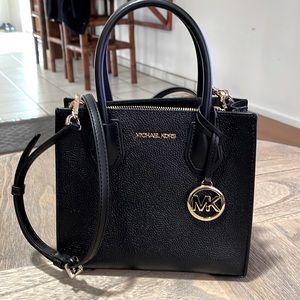 Michael Kors medium Mercer satchel with adjustable crossbody strap.
